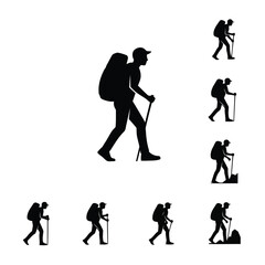 Naklejka premium Vector art of silhouette of a hiker with a backpack and walking stick isolated on white background
