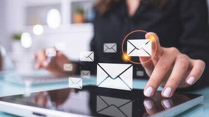 Professional businesswoman expertly managing digital communications and emails on a tablet interface with glowing icons, signifying connectivity and modern business.