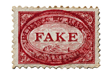 Obraz premium Red postage stamp with the word 