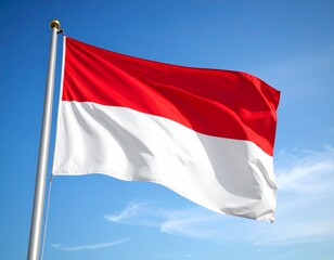 The red and white Indonesian flag for the Indonesian Independence Day design flies high above the bright blue sky