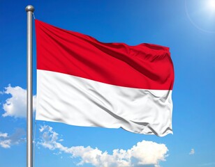 The red and white Indonesian flag for the Indonesian Independence Day design flies high above the bright blue sky