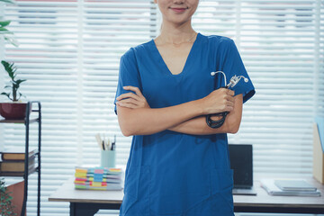 Confident healthcare worker: A confident healthcare professional, poised with a stethoscope, stands...
