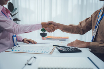 Business handshake for teamwork of business merger and acquisition,successful negotiate,hand...