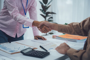Business handshake for teamwork of business merger and acquisition,successful negotiate,hand...