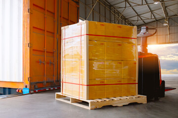 Bulk of Package Boxes Waiting to be Loaded into Containers Trucks. Distribution Shipping Cargo...