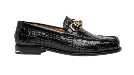 Elegant black crocodile leather loafer isolated on transparent background, a stylish and classic footwear choice for the modern gentleman, perfect for formal occasions and adding a touch of luxury