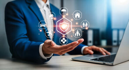 Businessman in a blue suit presenting a digital interface with various insurance icons, including health, life, car, and home, symbolizing comprehensive protection and financial security