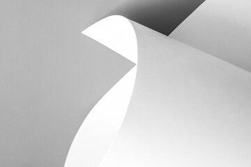 A sheet of white paper on a gray background. Background for design work.