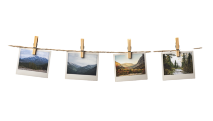 Four vintage-style photos of mountain landscapes, pinned to a clothesline