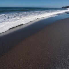 Obraz premium Dark Volcanic Sand Beach With White Surf Foam. 10