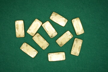 Gold bars, gold color, containing 96.5 percent gold.