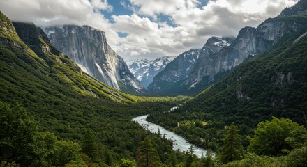 Fototapeta premium Yosemite's Grandeur: El Capitan and Snowy Peaks Above a Winding River