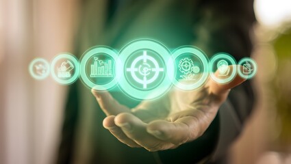 Fototapeta premium A businessman presents a set of glowing icons representing business goals and objectives, highlighting the importance of strategic planning, effective management, and innovative solutions for achievin
