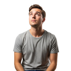 Obraz premium Pensive handsome young man looking up, with a thoughtful expression, isolated on a transparent background