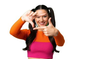 Smiling young woman making a frame with hands, isolated on a transparent background