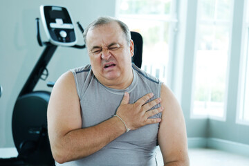 An overweight man is experiencing chest pain and tightness in his chest.