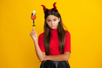 Halloween witch girl. Teen girl with pumpkin. Teen witch. Kid girl witch celebrates Halloween....