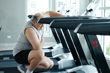 An overweight man is experiencing chest pain and tightness in his chest.