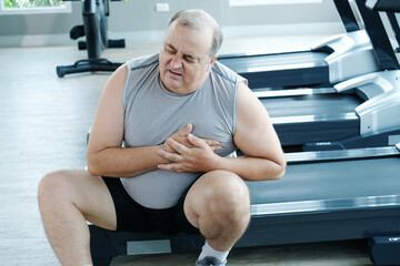 An overweight man is experiencing chest pain and tightness in his chest.