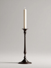 A tall, slender candlestick with an elegant design and dark bronze finish stands alone against the light gray background of your studio