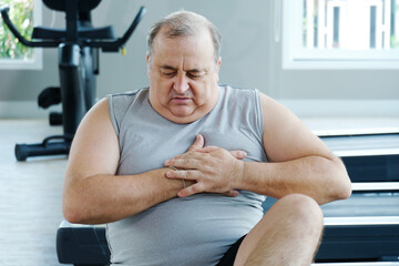 An overweight man is experiencing chest pain and tightness in his chest.
