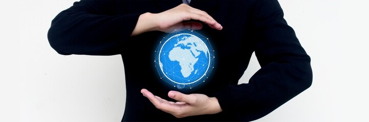 Connection business concept with a glowing digital globe held in a hand, symbolizing global...