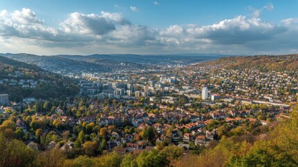 Obraz premium Cityscape panorama from above with autumnal trees