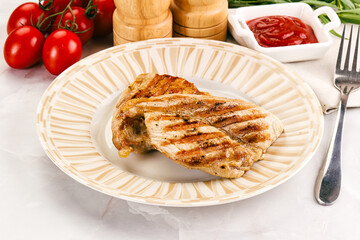 Grilled pork steak with sauce