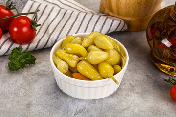 Turkish traditional marinated mini chili peppers