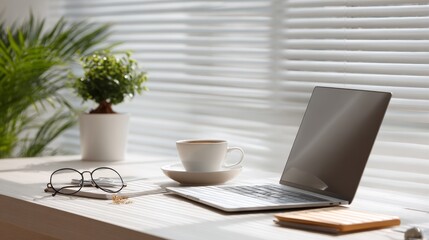 Bright Workspace with Natural Light and Green Plants