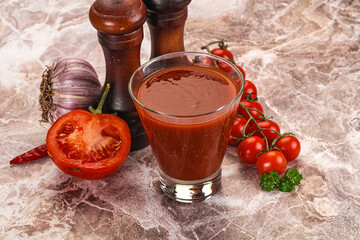 Fresh tomato juice in the glass