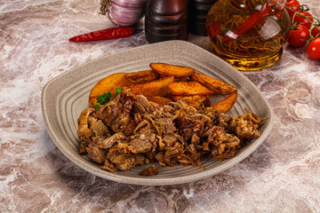 Baked shredded pork with potato