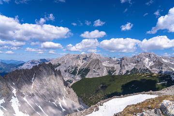 Panorama view of the Tyrolean Alps massif from top of Hafelekarspitze peak in spring, Innsbruck, Tyrol, Austria