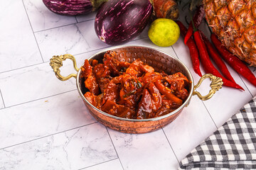 Asian cuisine - pork in chili sauce