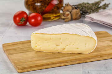 Soft brie cheese with mold