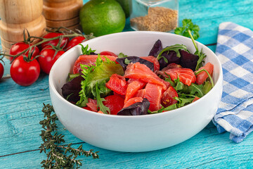 Salad with salmon and arugula