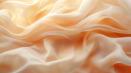 Fototapeta premium Soft, flowing peach-toned fabric draped in gentle folds