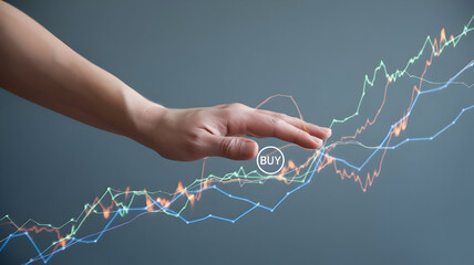 A fair skinned hand hovers over an ascending multicolored digital stock market graph showing lines of blue orange and green with a B U Y button in a circle