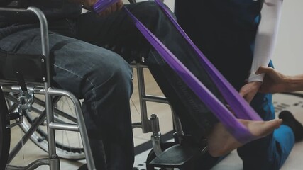 Senior Patient and physical therapist in rehabilitation walking exercises