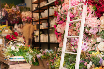 Vibrant flower shop interior beautiful floral arrangement elegant decor retail display blooming artificial blossoms decoration