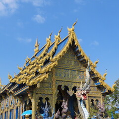 Wat Rong Suea Ten,Ornate architecture, Buddha and figures in the Blue Temple in Chiang Rai, Thailand, Asia