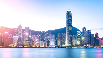 Obraz premium City skyline at dawn, with skyscrapers reflecting in calm water