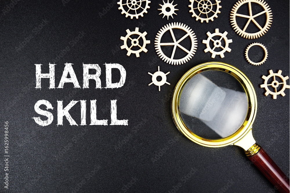 Poster hard skills text message with magnifying glass on black background