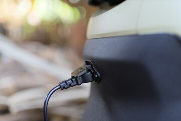 electric motorbike while charging the battery
