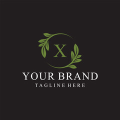 Initial letter X serif font logo design, green leaves nature graphic icon concept