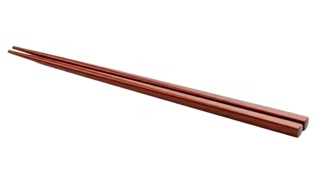 A pair of polished wooden chopsticks resting neatly parallel on a bright white background
