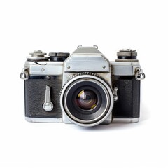 Front view of a vintage, metallic, and slightly tarnished 35mm SLR camera
