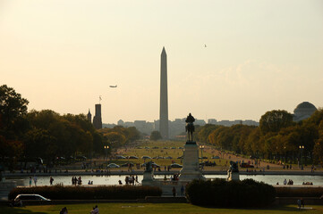 Full view of the Washington Monument photographed from a distance at ground level, showcasing its...