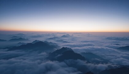 Misty peaks rise above a sea of clouds under a twilight sky, revealing a tranquil and majestic landscape at dusk