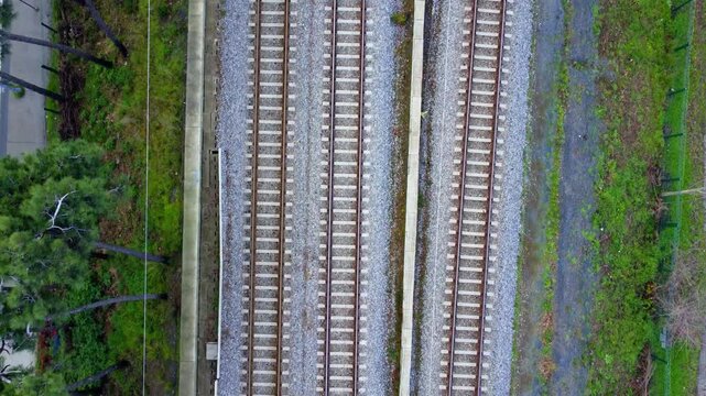 Top-Down Aerial View of Parallel Railway Tracks